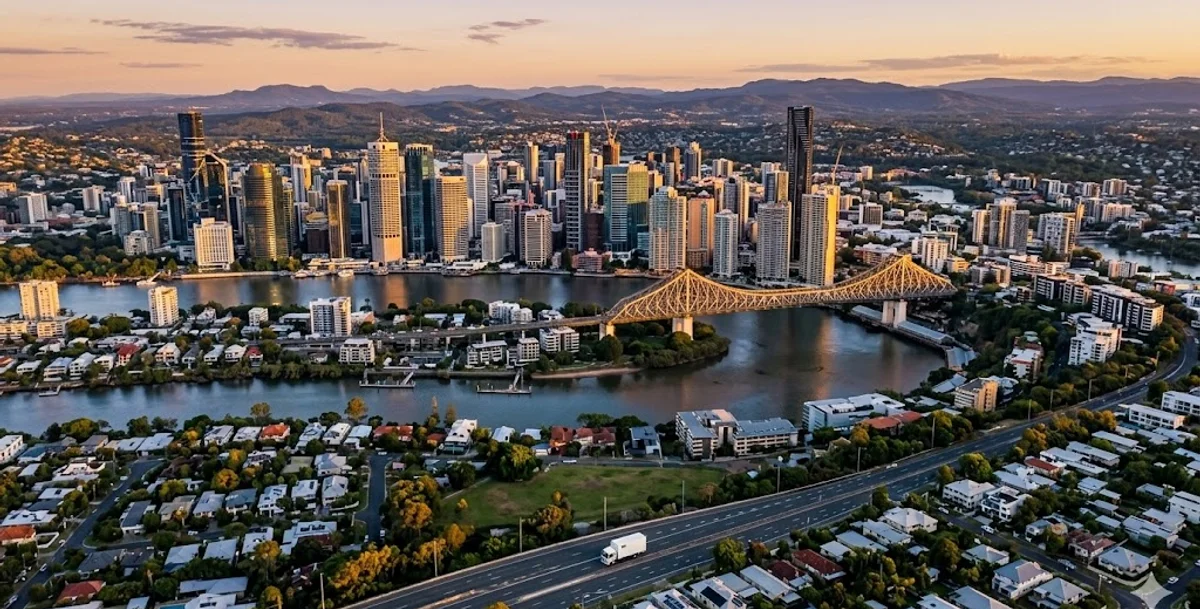 Aerial view of Brisbane city skyline with Story Bridge at golden hour