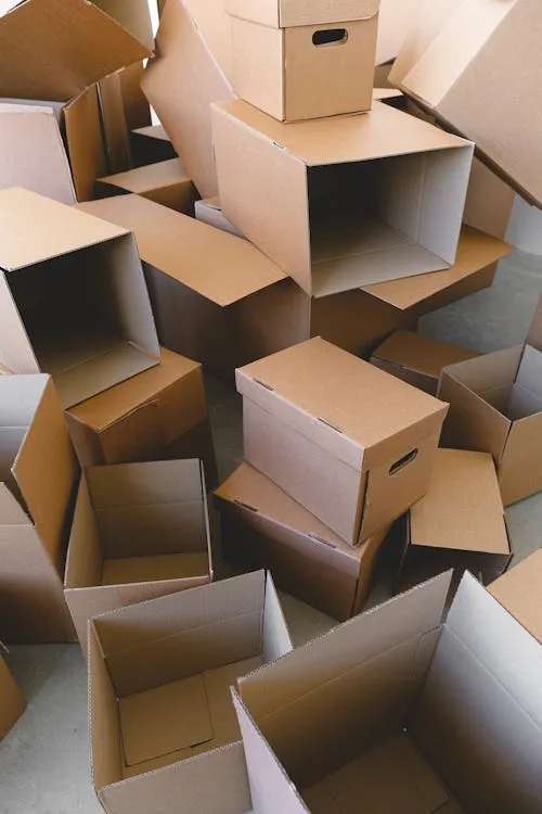Office removalists in Brisbane moving desks and IT equipment during a weekend business relocation